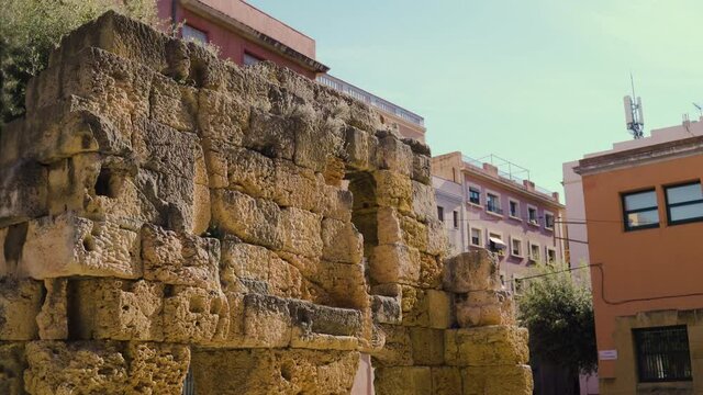 Real ruins or remains of Provincial Forum's portico of Tarraco, in the middle of the city of Tarragona, Spain.The Archaeological Ensemble of Tarraco is declared a UNESCO World Heritage Site Ref 875