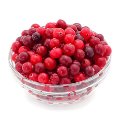Fresh red cranberries in a glass bowl.