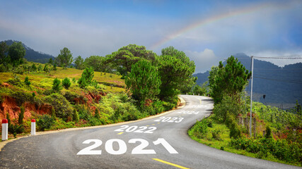 Journey to new year 2021 to 2025 on asphalt road surface with marking lines, happy new year concept...