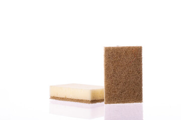 Organic eco-friendly sponges for washing dishes isolated on white background. Dual-sided scrubbing natural plant-based dish sponge recycled materials, ecology, environmental protection concept