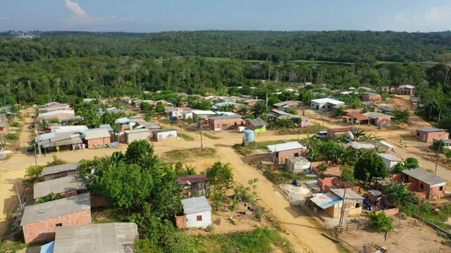 Indigenous slum outside the city of Manaus, Brazil. Aerial drone shot, push in. 