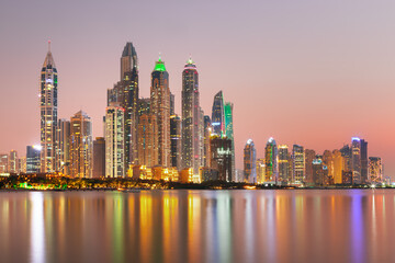 Fototapeta na wymiar Amazing and Luxury Dubai Marina - famous Jumeirah beach at sunrise, United Arab Emirates 
