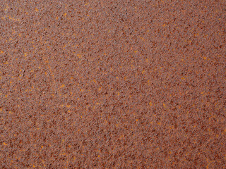 Corroded metal background. Rusty corrosion. Rusty metal surface with streaks of rust. Brown and orange rust and dirt on enamel. Rusted brown abstract texture.