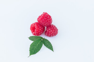 raspberries on a white background