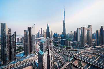 Fototapeta na wymiar Dubai - amazing city skyline with luxury skyscrapers at sunset, United Arab Emirates