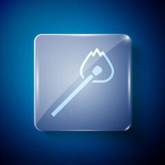 White Burning match with fire icon isolated on blue background. Match with fire. Matches sign. Square glass panels. Vector.