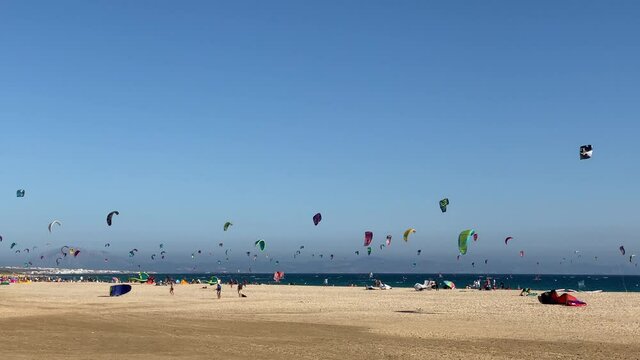 Many people practicing kitesurf in the beach of Tarifa Punta Paloma.