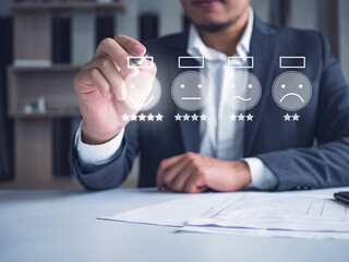 Concept of customer experience concept, businessman make check mark at a checkbox on excellent smiley face rating for a satisfaction survey.