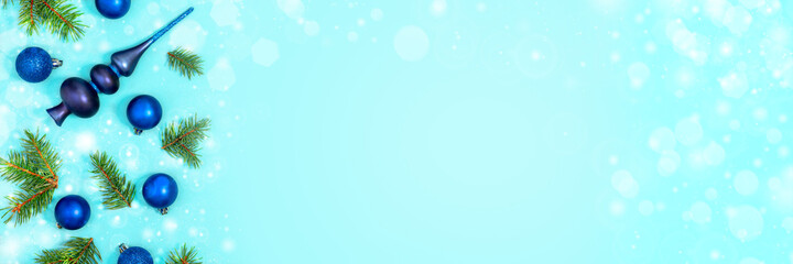 Christmas card with fir branches and decor.