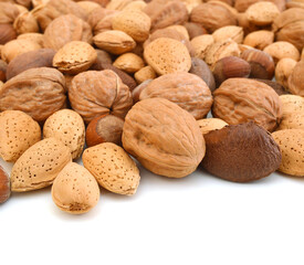 A Selection of nuts on a white background
