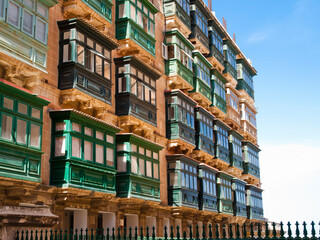 Obraz premium Building with green balconies in Valletta, the capital city of Malta