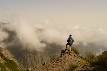 Hiking on the mountain ridge of Madeira Island on the way to Pico Ruivo, Portugal