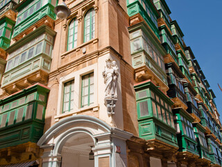 Obraz premium Building with green balconies in Valletta, the capital city of Malta