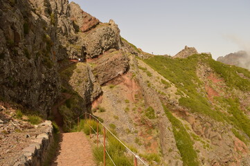 Hiking on the mountain ridge of Madeira Island on the way to Pico Ruivo, Portugal