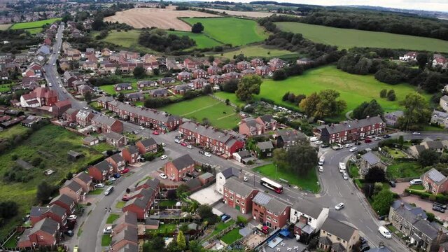 Hemingfield village outskirts & green fields,Barnsley, aerial overview
