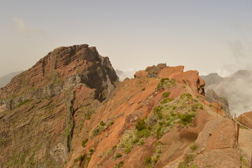 Hiking on the mountain ridge of Madeira Island on the way to Pico Ruivo, Portugal