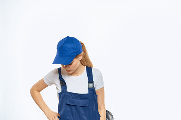 Woman in working uniform blue cap delivery courier delivery service