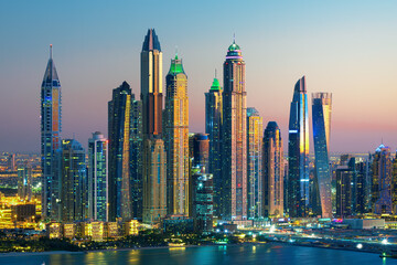 Dubai Marina skyscrapers and Jumeirah beach at sunrise, United Arab Emirates