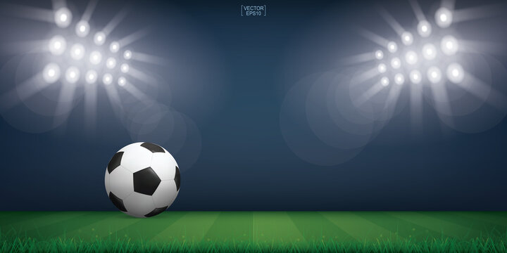 Soccer football ball on green grass of soccer field. Background of soccer stadium with lighting of spotlight. Vector.