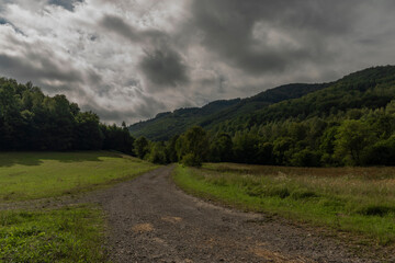 Fototapeta na wymiar Green forests and road to Slovakia Poland border near national park Poloniny