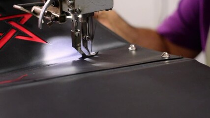 Italian shoemaker, making leather bag with traditional machines.

Location: South Tyrol, Italy
