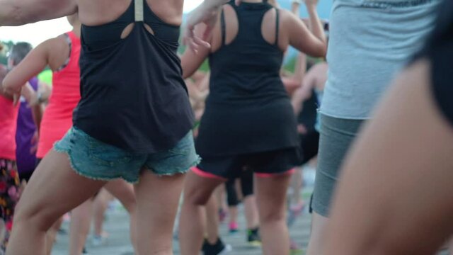 women dancing zumba, zumba group dance.

Location: Italy