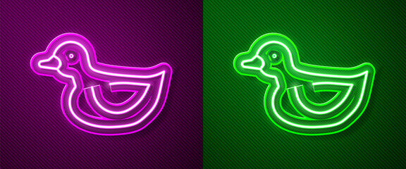 Glowing neon line Rubber duck icon isolated on purple and green background. Vector.
