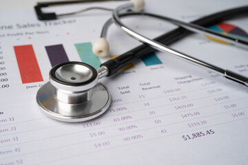 Stethoscope on chart graph paper, finance, account, statistic, analytic economy Business concept.