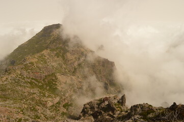 Fototapeta na wymiar The dramatic, misty and beautiful mountain landscape of Madeira Island in Portugal