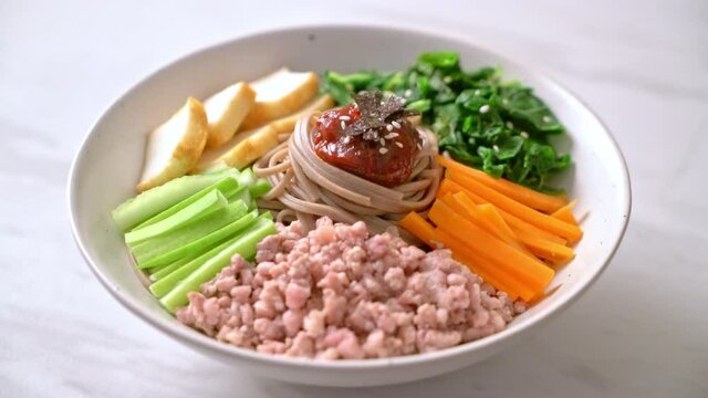 Korean spicy cold noodles - bibim makguksu or bibim guksu - Korean food style