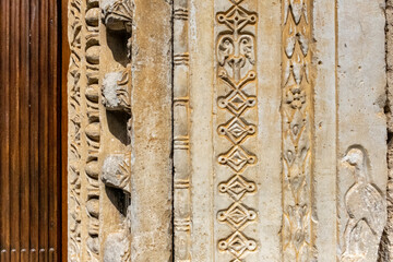 DOOR old ornamented entrance to the building