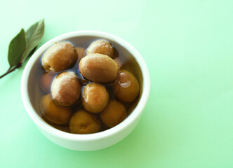 bowl of olives with olive oil