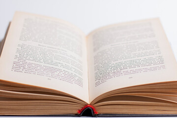 Open book on a white background. close up