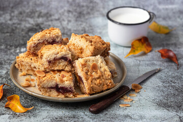 Homemade pie with jam and a cup of milk