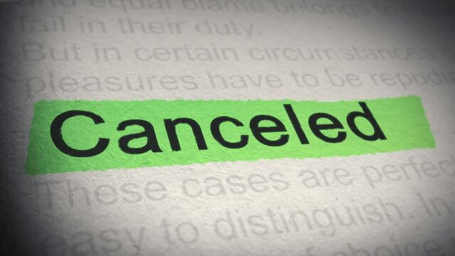 Canceled. Highlighter pen marks word in Newspaper. Closeup. Thumbing pages and promoting text with marker. 4K