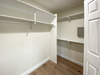 Big empty modern wardrobe dressing room inside big house