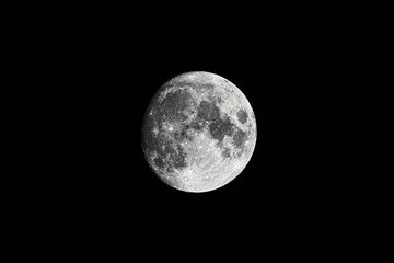 Full moon on black background. Close up Image.