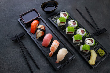 Seafood delicatessen sushi rolls set on plates