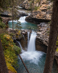 Fototapeta na wymiar Cascading waterfalls at Johnston Canyon (Banff, Alberta, Canada)