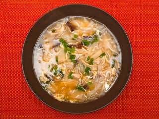 Chinese chicken soup with mushrooms