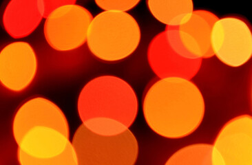 Abstract Blurred Orange Color Illuminated Light Splashing on Black Background