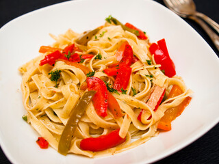 Tagliatelle with peppers and parsley