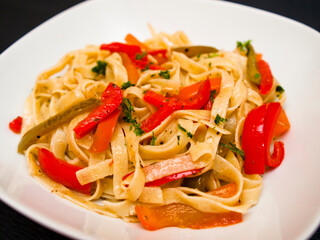 Tagliatelle with peppers and parsley