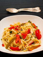 Tagliatelle with peppers and parsley