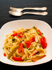Tagliatelle with peppers and parsley