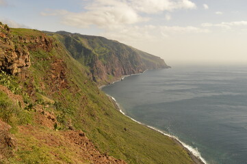 Hiking along the coast, by the waterfalls and in the green levadas of Madeira Island in Portugal