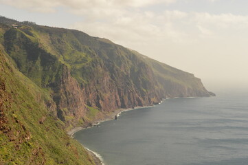 Hiking along the coast, by the waterfalls and in the green levadas of Madeira Island in Portugal