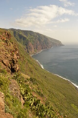 Fototapeta premium Hiking along the coast, by the waterfalls and in the green levadas of Madeira Island in Portugal