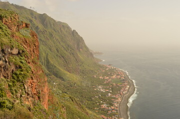 Hiking along the coast, by the waterfalls and in the green levadas of Madeira Island in Portugal