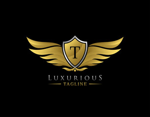 Luxury Wings Logo With T Letter. Elegant Gold Shield badge design for Royalty, Letter Stamp, Boutique,  Hotel, Heraldic, Jewelry, Automotive.